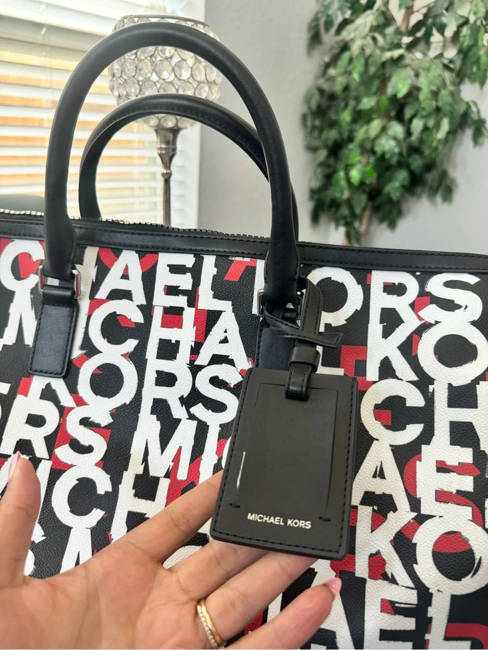 Michael Kors bold logo